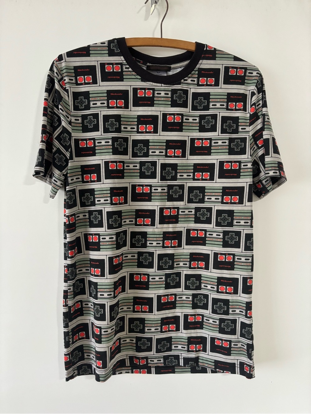 Nintendo Black Graphic Tee with Red and Gray Controller Pattern